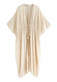 Beige randig kaftan med djup V-ringning, samlad midja och knytning. Har mjukt tyg och flödande korta ärmar. Pompomer pryder knytningarna.