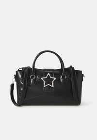Black handbag made of faux leather featuring a star-shaped silver accent, dual handles, and an adjustable shoulder strap.