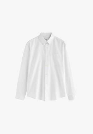 Valge pika varrukaga puuvillane särk, millel on nööpidega krae, üks rinnatasku ja mugav lõige. Ees on väikesed nööbid.