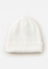 Soft white knit beanie hat with a folded ribbed cuff, displayed flat on a white background.