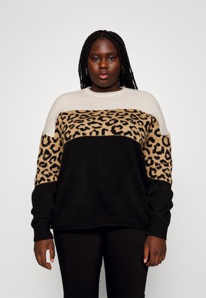 Knit sweater featuring a cream yoke, a leopard print middle section in tan and black, and a black lower body. Loose fit with long sleeves.
