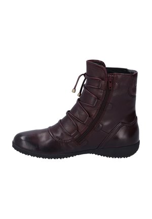 Bottine en cuir bordeaux avec une tige texturée, fermeture éclair latérale et lacets élastiques. Semelle en caoutchouc avec un motif pour l'adhérence.