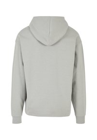 Lys grå, hætte sweatshirt med tekstureret stof. Har lange ærmer og en afslappet pasform, uden synlige logoer eller mønstre.