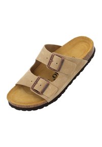 Sandalias de ante beige con dos correas ajustables y hebillas en tono cobre. Plantilla de corcho marrón con una suela de goma negra texturizada.
