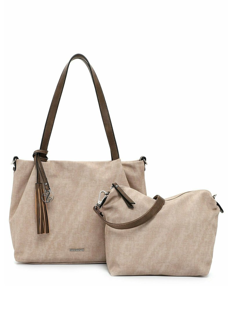 Sac à main en tissu beige avec des accents en cuir marron, comportant un détail de frange et une petite pochette assortie. Texture lisse, design simple.
