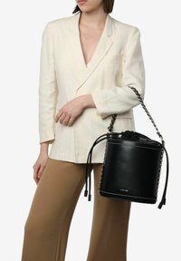 Miriade Borsa a mano - nero