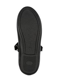 Suela de zapato negra con goma texturizada, con un contorno suave, un parche de agarre circular y un pequeño número de tamaño grabado en la superficie.