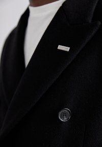 EYTYS GENESIS  - Klassisk kappa / rock - black