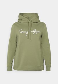 Oliivinvihreä huppari, joka on valmistettu puuvillasta. Siinä on kenguru-tasku, nyöritys-huppu ja edessä valkoisella brodeerattu "Tommy Hilfiger" -logo.