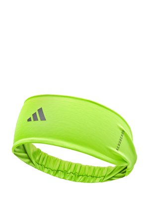 Green athletic headband with a smooth texture, elastic design, and a gathered section. Features a gray logo on the front.