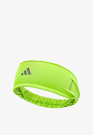 Green athletic headband with a smooth texture, elastic design, and a gathered section. Features a gray logo on the front.