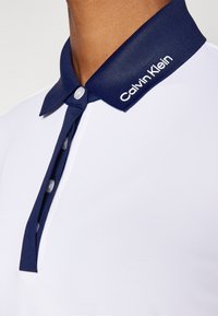 Calvin Klein Golf WHITNEY SLEEVE  - Polotričko - white