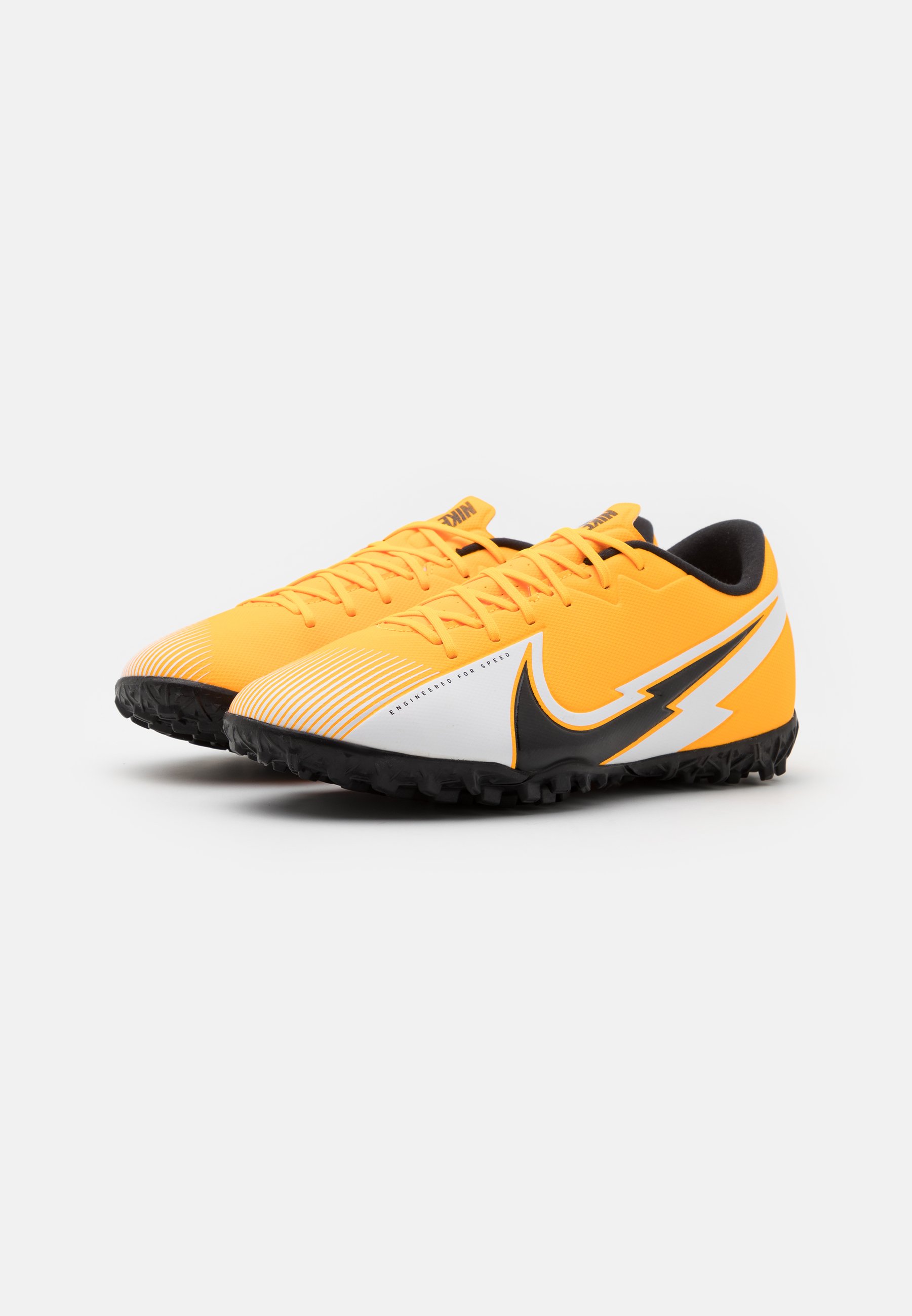 yellow nike astro turf