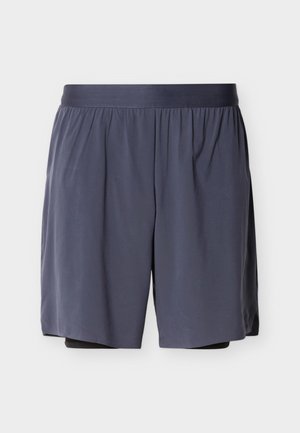 Navy blue athletic shorts with an elastic waistband and an inner black compression layer, displayed on a white background.