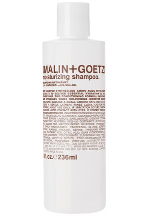 Weiße Plastikflasche mit feuchtigkeitsspendendem Shampoo, mit braunem Text. 236 ml Kapazität. Das Etikett listet Inhaltsstoffe und Anwendungshinweise auf.