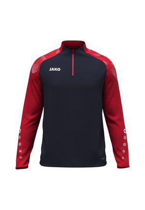 Long-sleeve sports top with navy body, red sleeves, quarter zip neckline, JAKO logo on chest, and patterned white details on shoulders and sleeves.