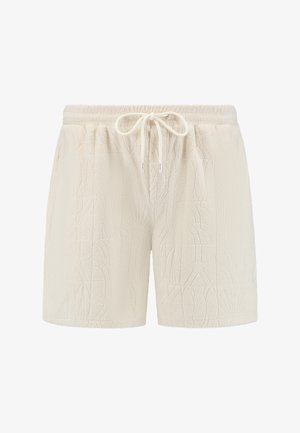 Kremowe szorty z teksturowanego materiału z kwiatowym wzorem, z elastycznym pasem i sznurkiem do regulacji.