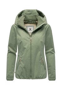 Veste zippée vert clair avec capuche, en tissu texturé, poches latérales avec zippers et poignets côtelés. Étiquette de marque visible à l'intérieur.