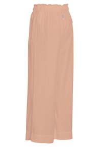 Breda byxor i blek persikofärg, tillverkade av lätt tyg, med elastiskt midjeband och raka fållar med en slät textur.