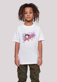 White cotton t-shirt featuring a cartoon character with stars and the text "BB" in vibrant colors. The design is central on the shirt.