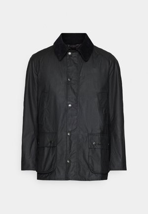 Black waterproof jacket with a corduroy collar, snap buttons, and two front pockets featuring a smooth texture and a classic design.