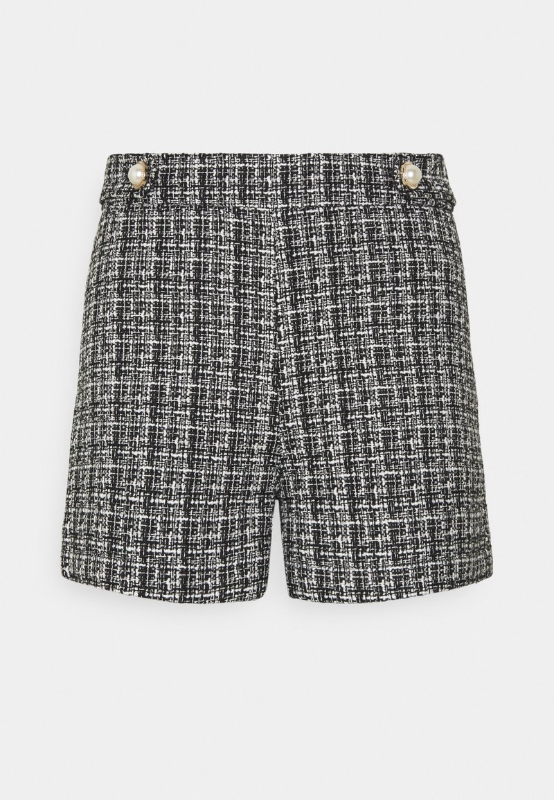 Shorts en tweed noir et blanc avec un motif texturé, présentant une coupe droite et deux boutons en perles en accent à la taille.
