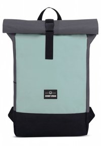 Roll-top backpack made of green and gray waterproof material with black accents, featuring a front label, adjustable straps, and side pocket.