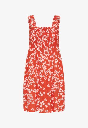 Abito rosso floreale con fiori bianchi, scollatura quadrata, spalline larghe, corpino arricciato e gonna fluente. Tessuto leggero, design casual.