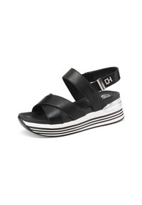 Sandali platform neri in pelle con cinghie incrociate, una soletta imbottita e un suola a zeppa a strisce con dettagli argentati.