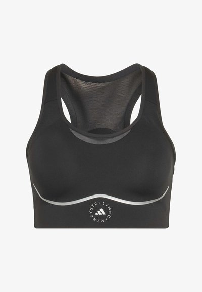 Sort sports-bh med racerback-netpanel, reflekterende sølvkurvedetalje og cirkulært Adidas by Stella McCartney-logo på frontens midte.