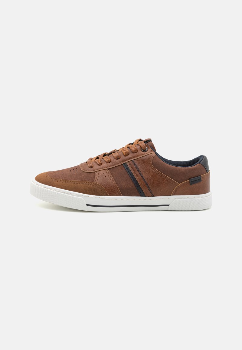 Brown leather sneakers featuring a smooth texture, white rubber sole, black accents, and decorative stitching with side stripes.