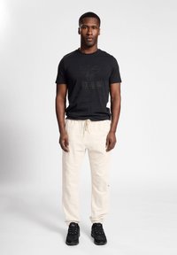 Hummel ICONS GRAPHIC - T-shirts print - black