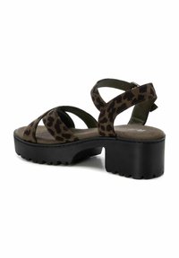 Sandalias de plataforma con estampado de leopardo marrón, con tiras entrelazadas, suela de goma negra texturizada y plantillas acolchadas para mayor comodidad.