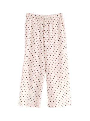 Hvide pyjamasbukser med et mønster af små røde hjerter. Elastisk talje med snore, blød tekstur og løs, bred ben-design.