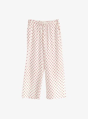 Hvide pyjamasbukser med et mønster af små røde hjerter. Elastisk talje med snore, blød tekstur og løs, bred ben-design.