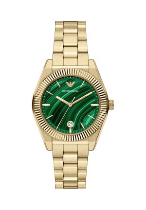 Zegarek na rękę w złotym kolorze z okrągłą kopertą i zieloną tarczą z malachitu. Posiada okienko daty oraz teksturowaną metalową bransoletę.