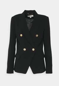 Blazer noir croisé avec boutons dorés, revers crantés, poches à rabat et une doublure intérieure lisse.