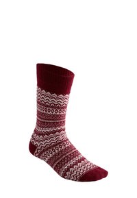 Piros-fehér kötött zokni geometrikus cikk-cakk és csíkos mintával, felhajtott szegéllyel, egyszínű sarokkal és orral.