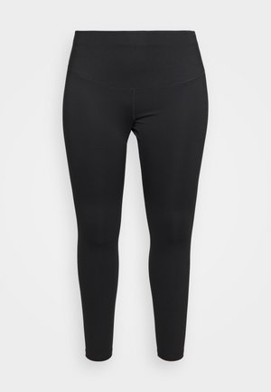Leggings neri realizzati in tessuto elasticizzato, caratterizzati da una vita alta e un design senza cuciture. Texture liscia senza motivi o parti metalliche visibili.