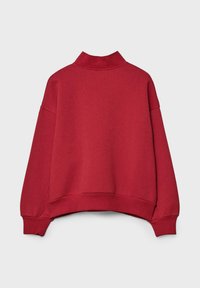 Felpa rossa tagliata con collo alto, spalle cadenti e polsini a coste. Realizzata in materiale morbido e strutturato.