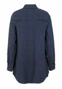 Tummasta denimistä valmistettu pitkähihainen paita, jossa on kaulus, nappihihansuut, kaareva helma ja selkäosa yksityiskohtineen. Liukas rakenne, jossa on vain vähän ompelukorostuksia.