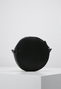 mint&berry Axelremsväska - black