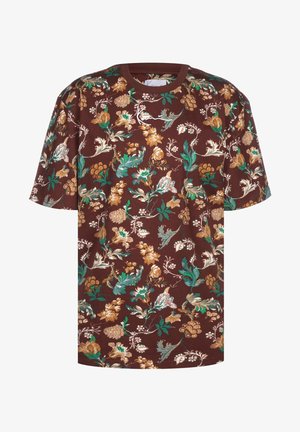 Brązowy kwiatowy T-shirt z żywymi zielonymi, żółtymi i białymi wzorami. Wykonany z miękkiego materiału, z okrągłym dekoltem i krótkimi rękawami.