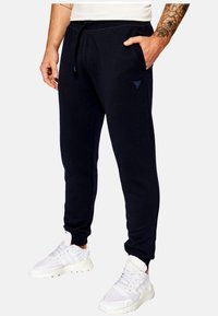 Guess ALDWIN  - Spodnji deli trenirk - azul