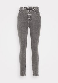 Džíny s vysokým pasem v bledě černém denimovém provedení, vybavené pěticí knoflíků, jemnými švy a hladkou strukturou.