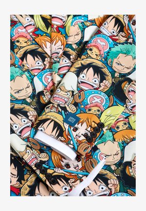 Kleurrijk pak met een dichtgepakt cartoonprint van verschillende personages. Materiaal lijkt glad met een witte binnenkant en vijf zwarte knopen.