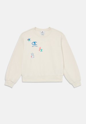 Sweatshirt creme com gola redonda e mangas longas, apresentando logótipos e padrões bordados coloridos na parte da frente.