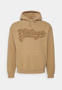 UNISEX HOODIE WITH VINTAGE SUPPLY RETRO VARSITY LOGO GRAPHIC - Camisola - tan