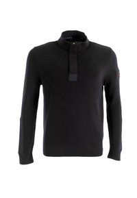 Pullover nero lavorato a maglia con colletto alto, dotato di un pannello nero a contrasto sul collo e toppe sui gomiti. Texture a coste in tutto il capo.