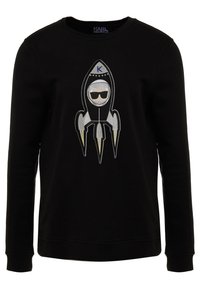 Černá mikina s dlouhými rukávy s grafikou rakety a postavičkou s n sunglasses, vyšitá stříbrnými a zlatými akcenty.